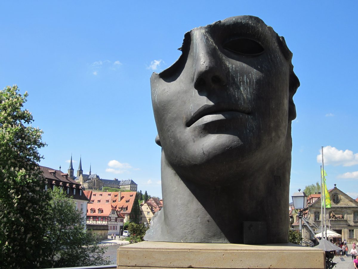 Igor Mitoraj Centurione I monumental bronze sculpture with Michaelsberg Abbey, Bamberg Germany — permanent public installation