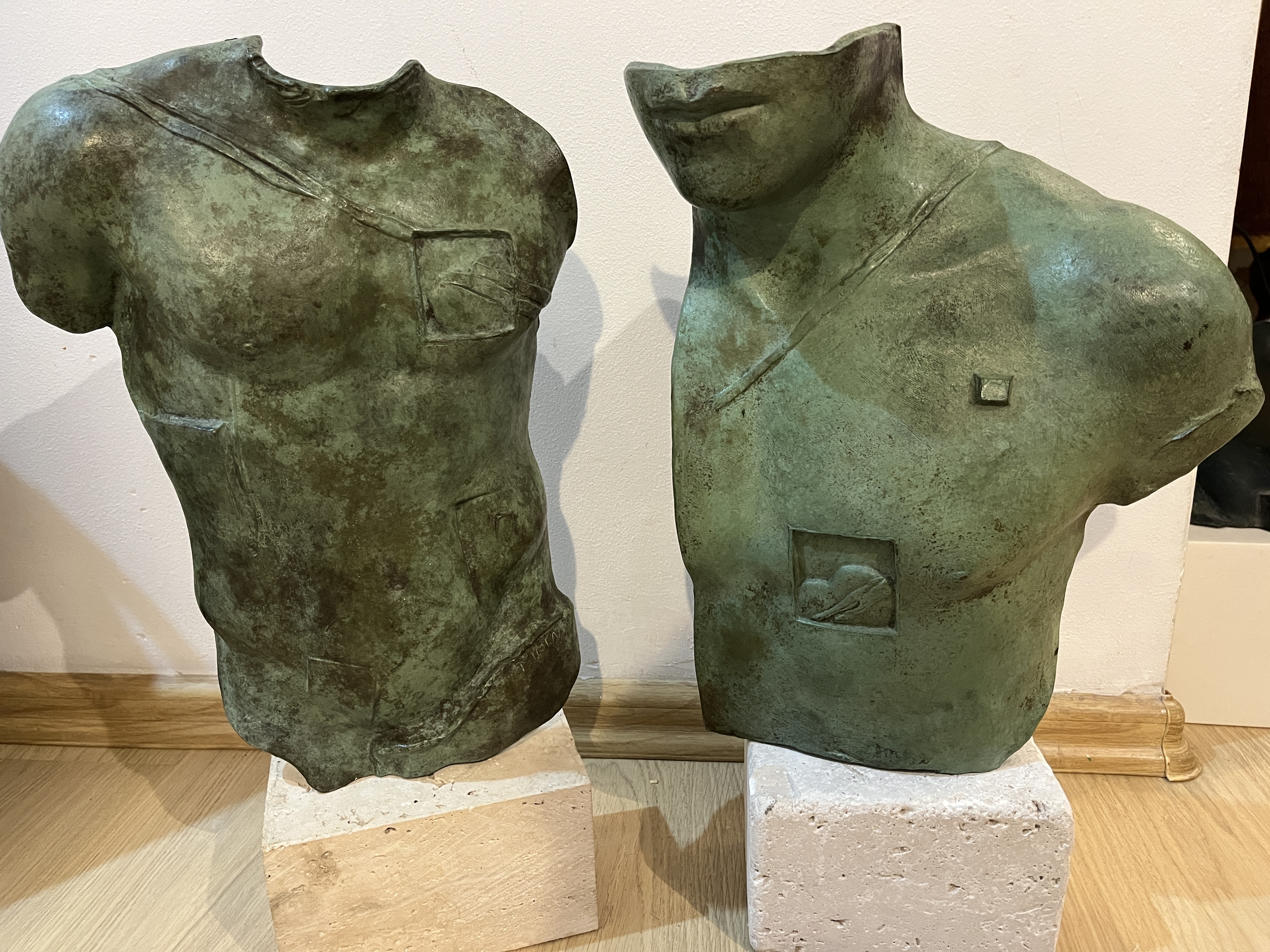 Pair of bronze torsos — Igor Mitoraj