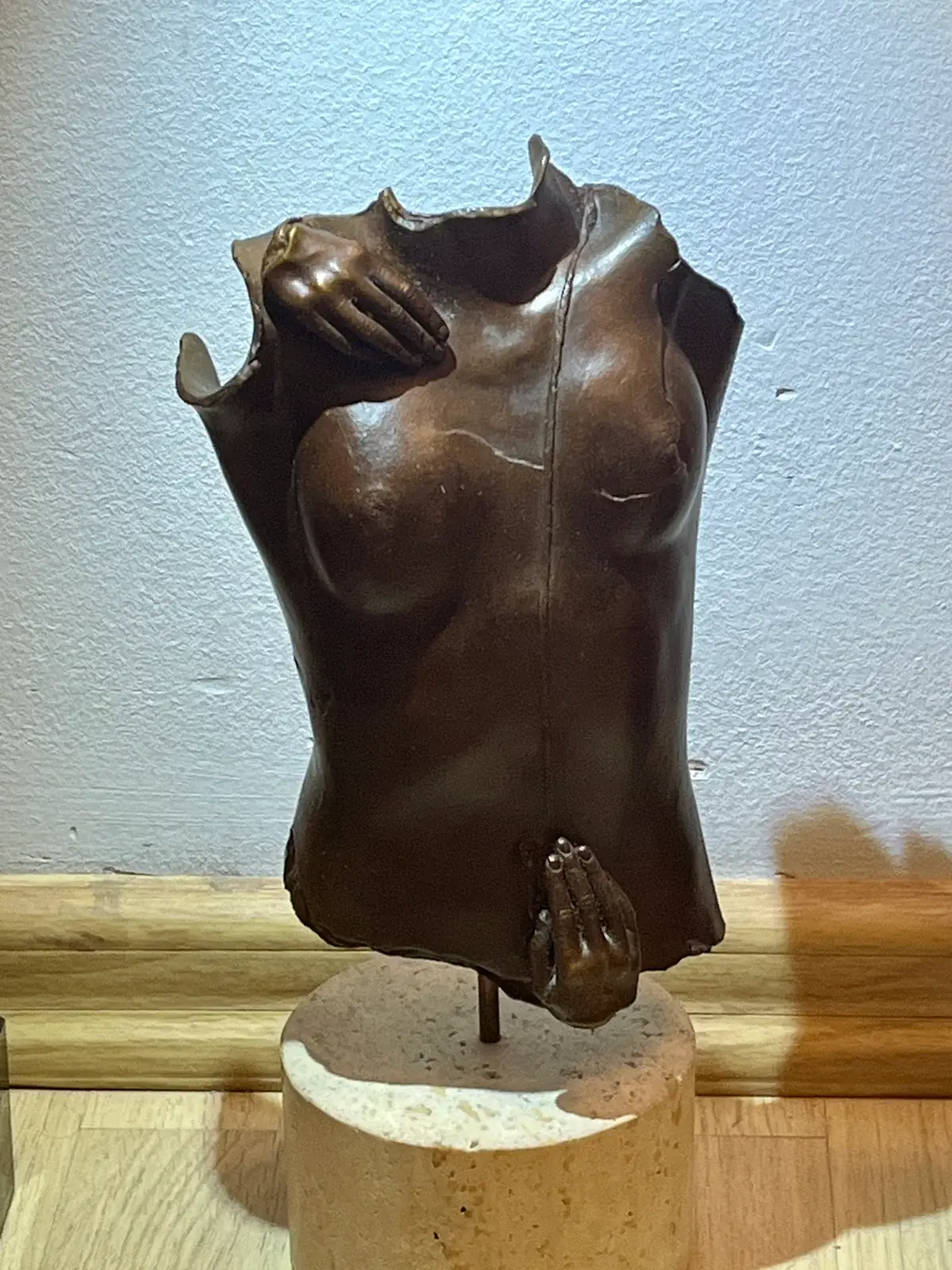Kea (1979) — Igor Mitoraj, bronze torso, three-quarter view, dark patina