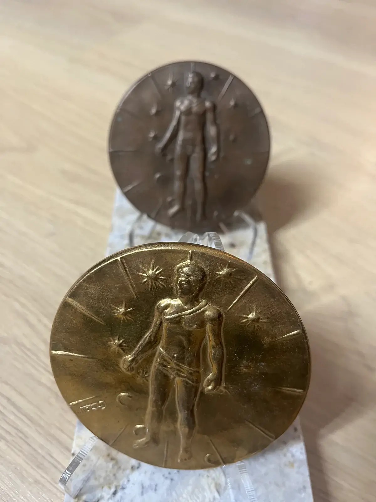Mitoraj Articulations — overhead view, both medals