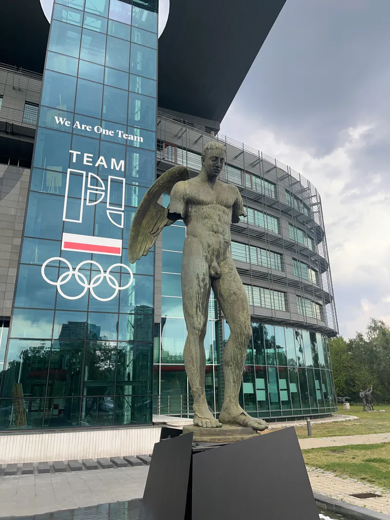 Ikaro Alato Mitoraj — full figure against glass facade, Polish Olympic Committee Warsaw